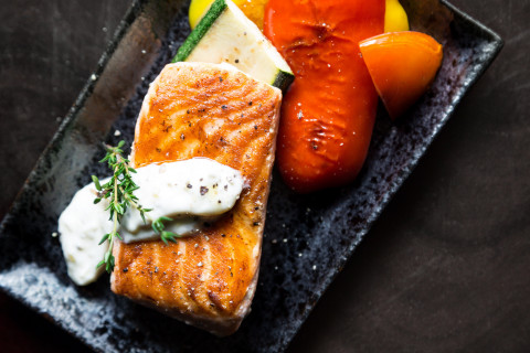 grilled-salmon-fish-on-rectangular-black-ceramic-plate-842142-1.jpg